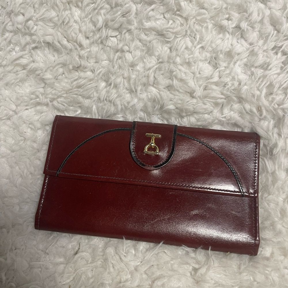 Baronet genuine leather 430 womens wallet gold tone accents and hardwares.